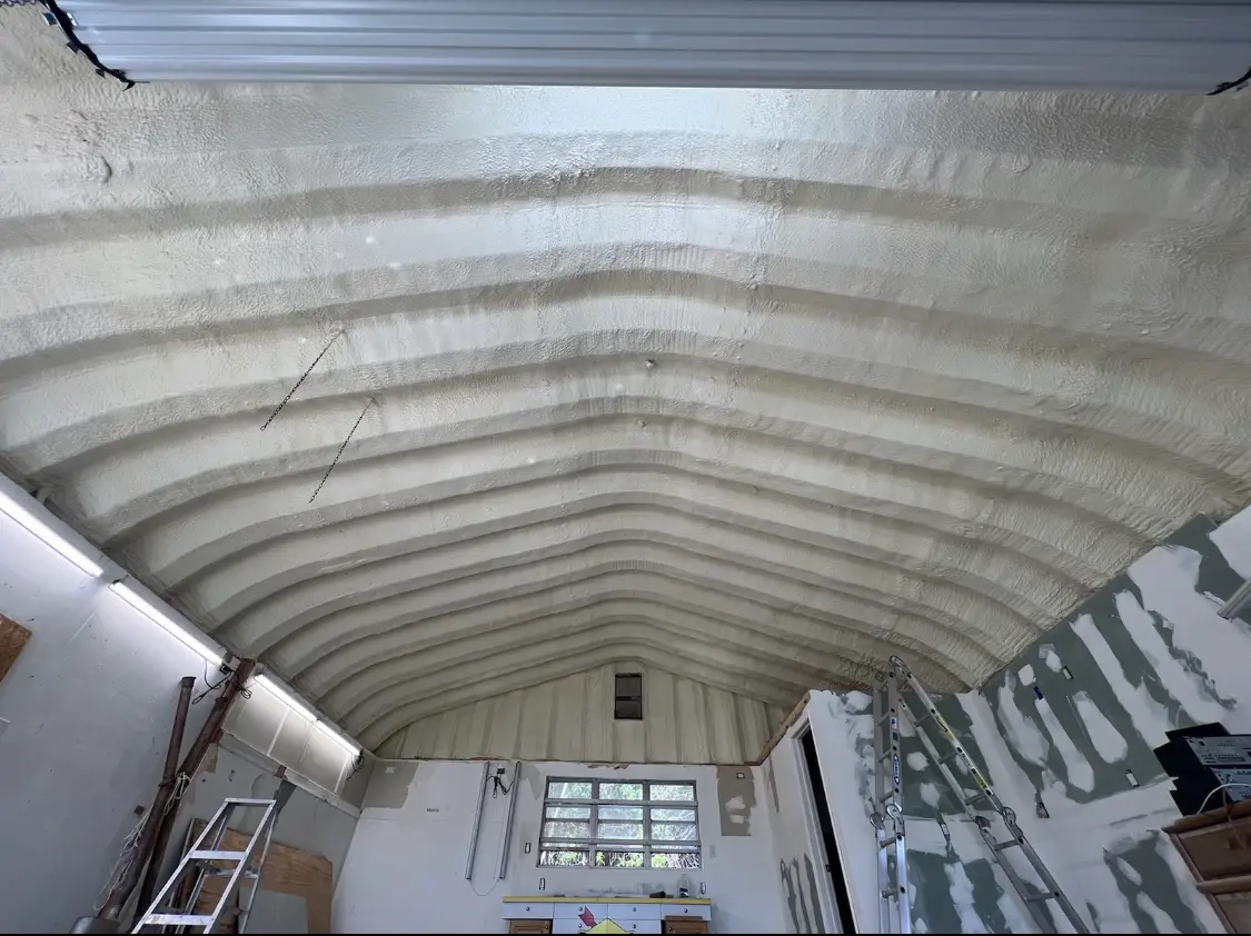 Spray polyurethane foam applied to the underside of a metal roof deck in Prescott
